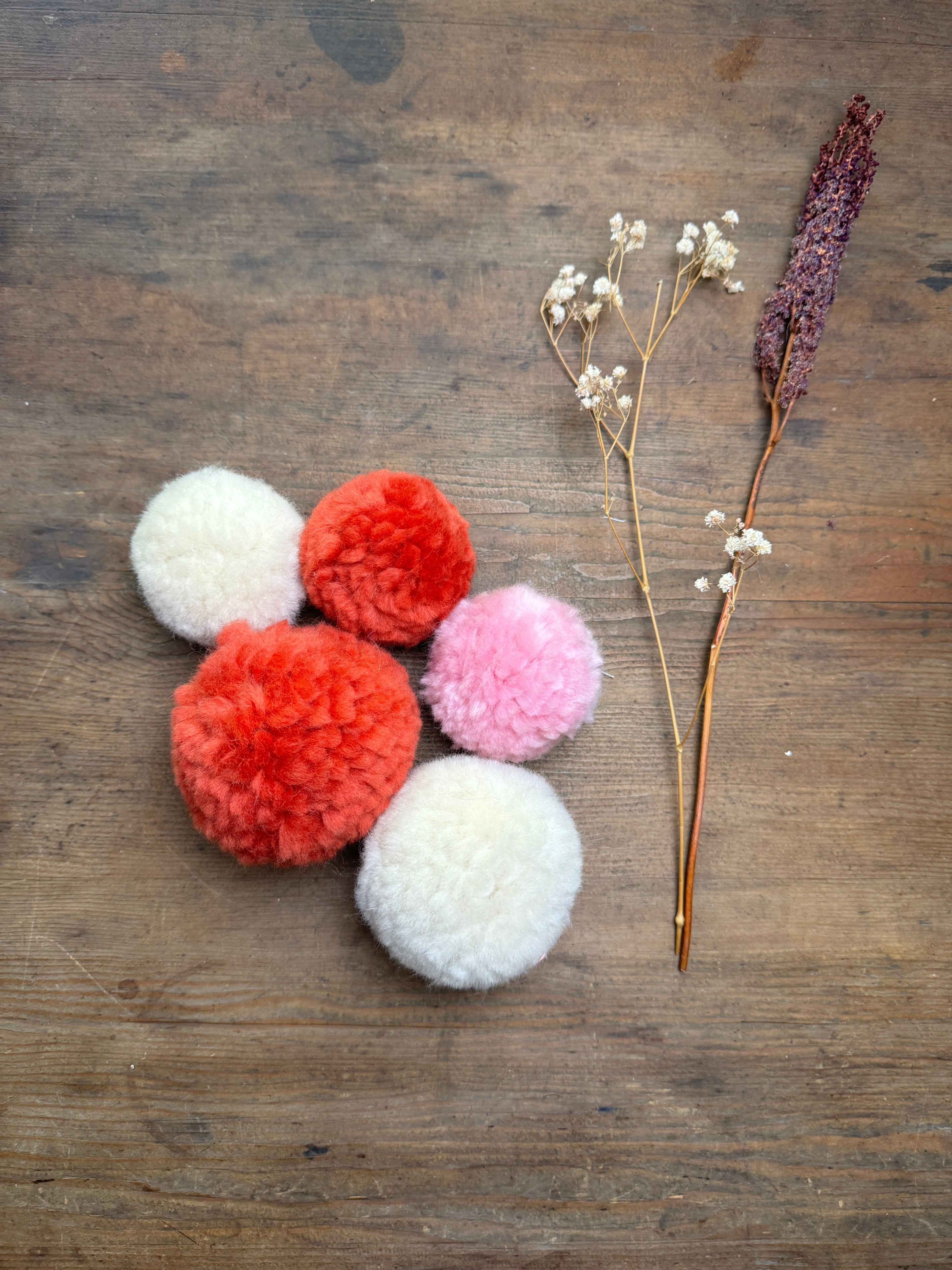 Add a pom pom to any hat order